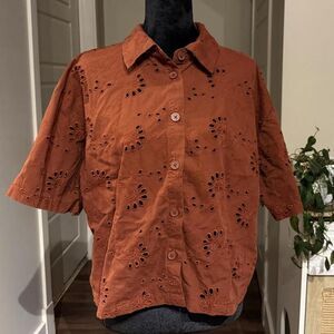 red future collective blouse with embroidered floral cut-out pattern